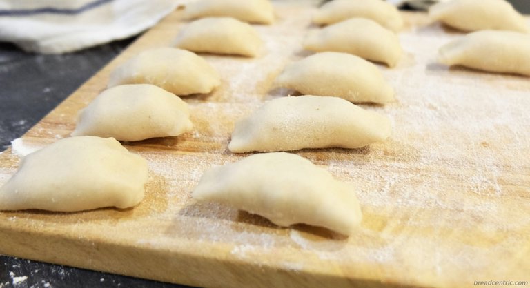 A dusted chopping board for dumplings waiting to be cooked will also be handy
