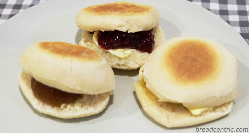 English muffins with honey, jam and butter